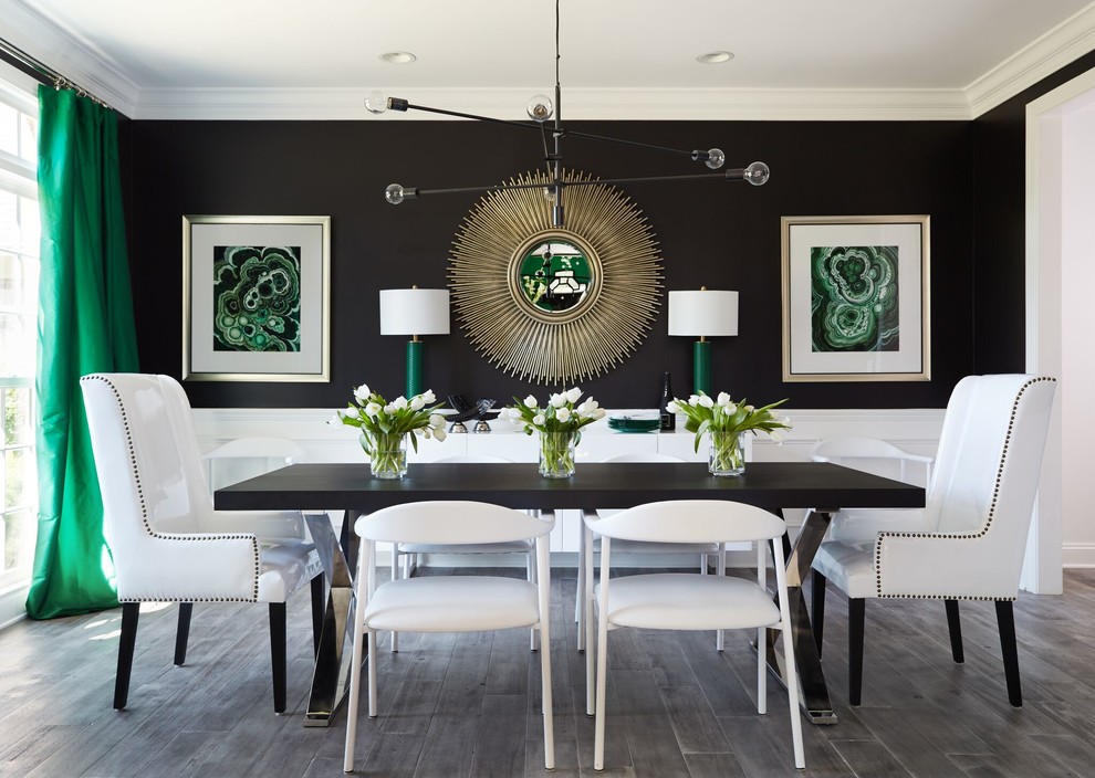 Transitional gray floor and medium tone wood floor enclosed dining room photo in DC Metro with black walls