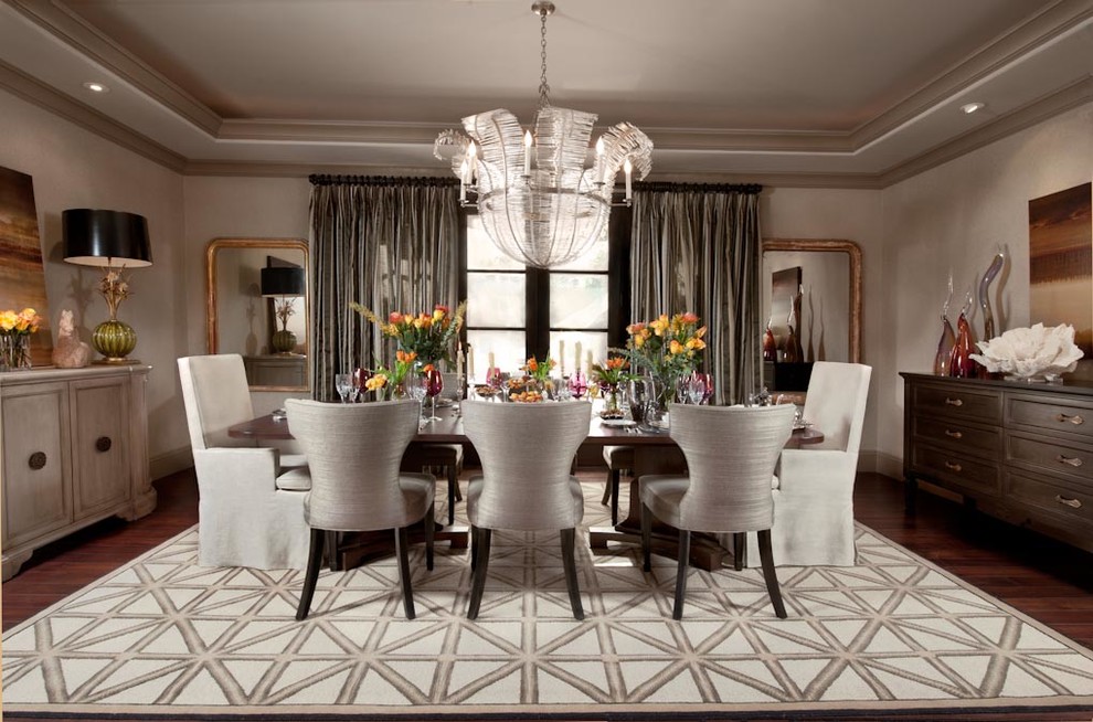 Inspiration for a medium sized modern enclosed dining room in Los Angeles with grey walls, carpet and feature lighting.