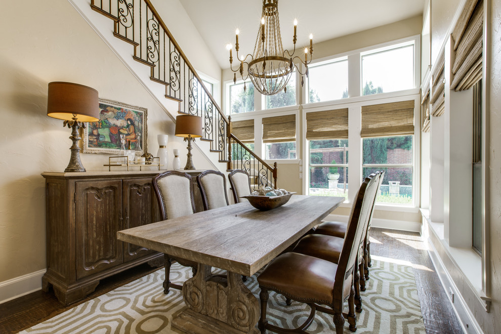 Dining room - traditional dark wood floor dining room idea in Atlanta with beige walls and no fireplace