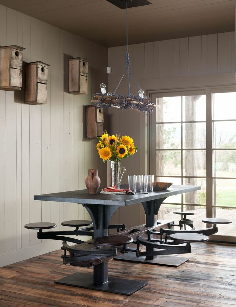 Inspiration for a rustic dining room in Atlanta with beige walls.
