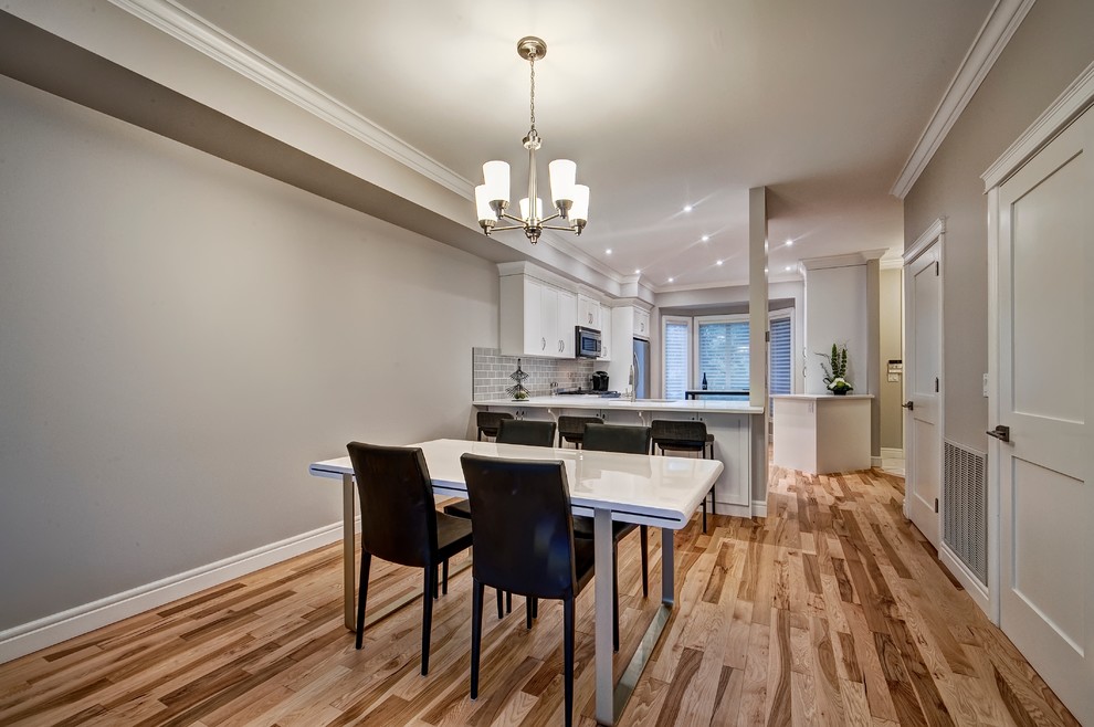 Design ideas for a contemporary dining room in Calgary.