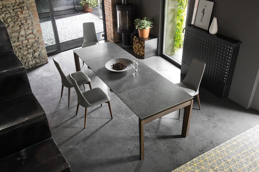 Example of a minimalist dining room design in Other