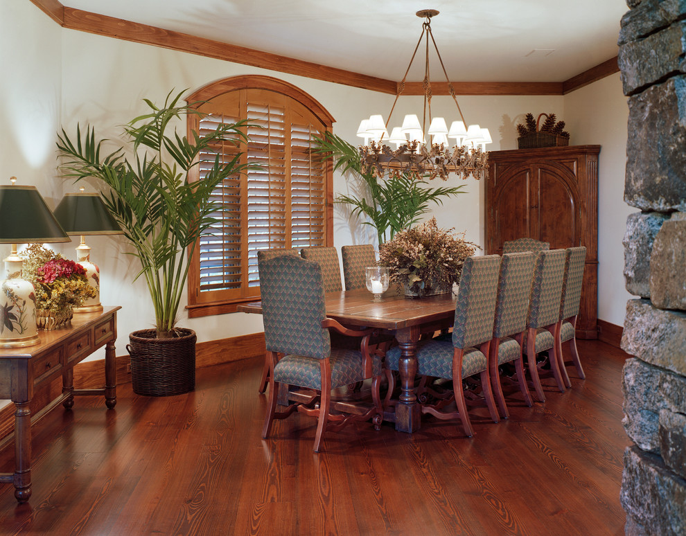 Design ideas for a large classic enclosed dining room in Atlanta with white walls and dark hardwood flooring.