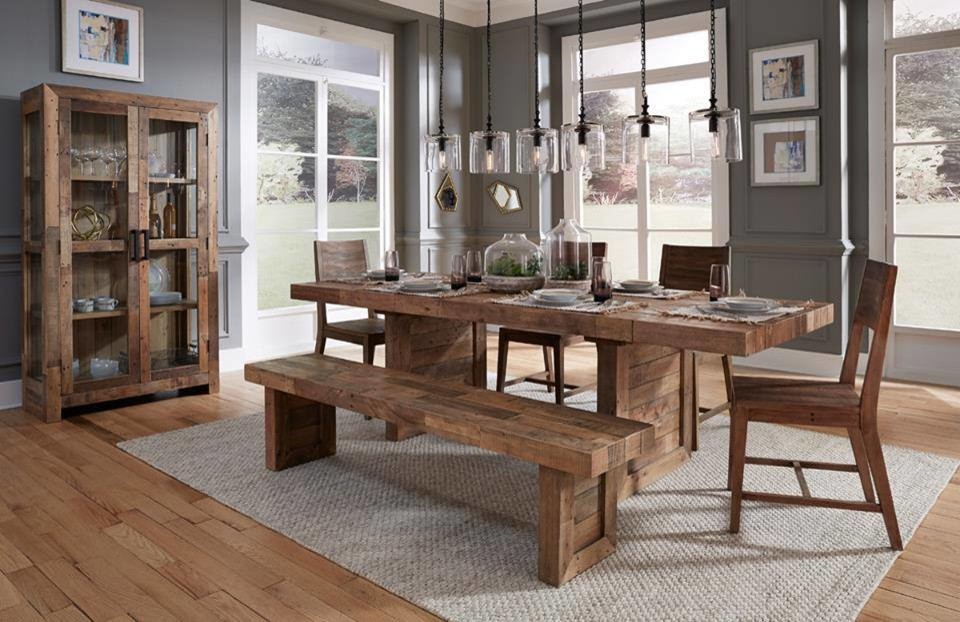Example of a mid-sized mountain style light wood floor dining room design in Orange County with gray walls