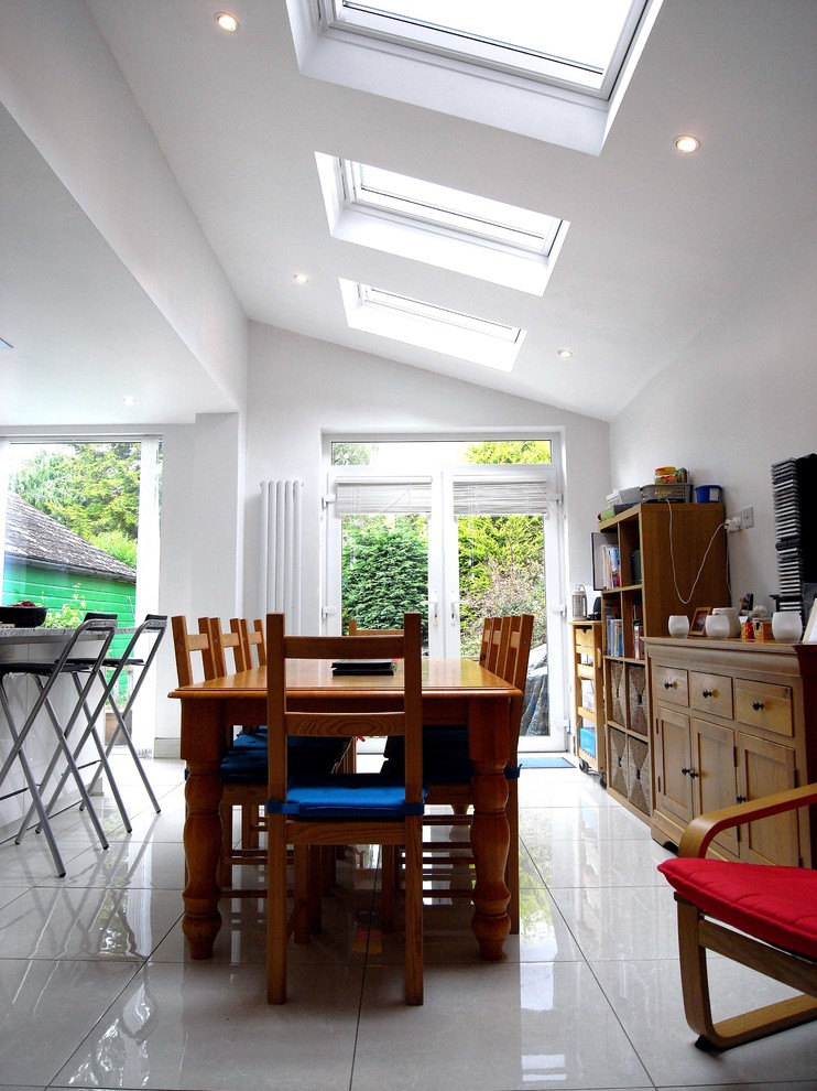 This is an example of a contemporary dining room in Belfast.