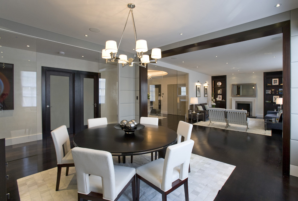 Contemporary dining room in DC Metro with feature lighting.