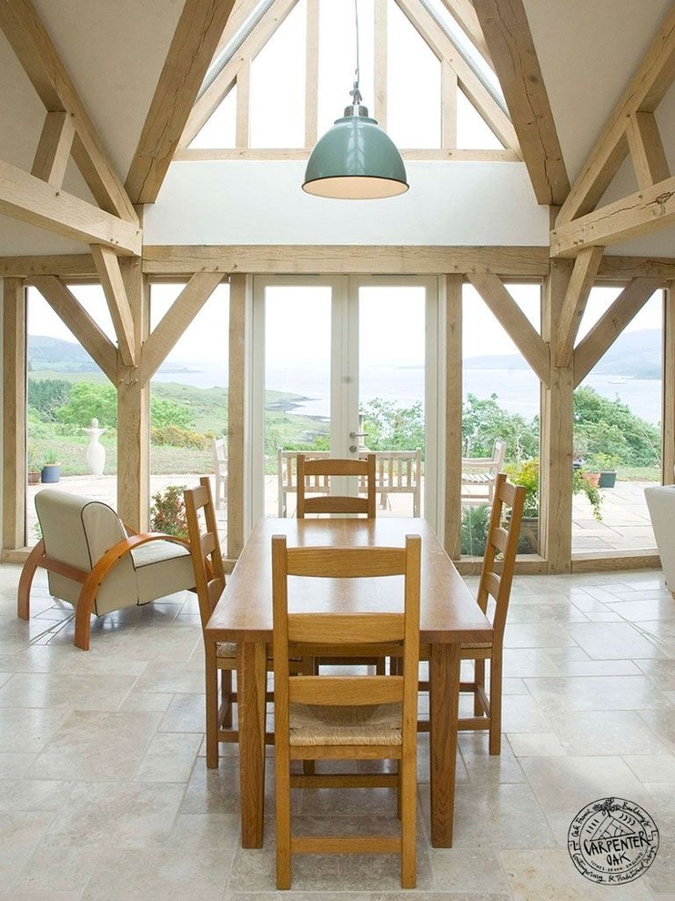 This is an example of a contemporary dining room in Devon with white walls and porcelain flooring.