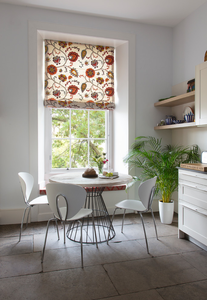 Design ideas for a classic dining room in Edinburgh with white walls.