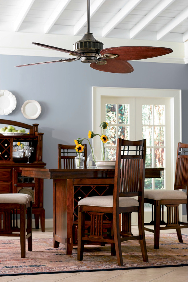 Design ideas for a medium sized world-inspired enclosed dining room in San Diego with blue walls and no fireplace.