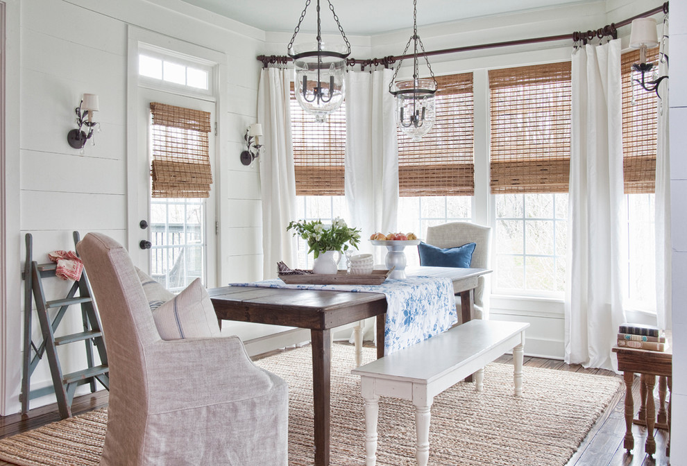 Inspiration for a farmhouse dark wood floor dining room remodel in Atlanta with white walls and no fireplace