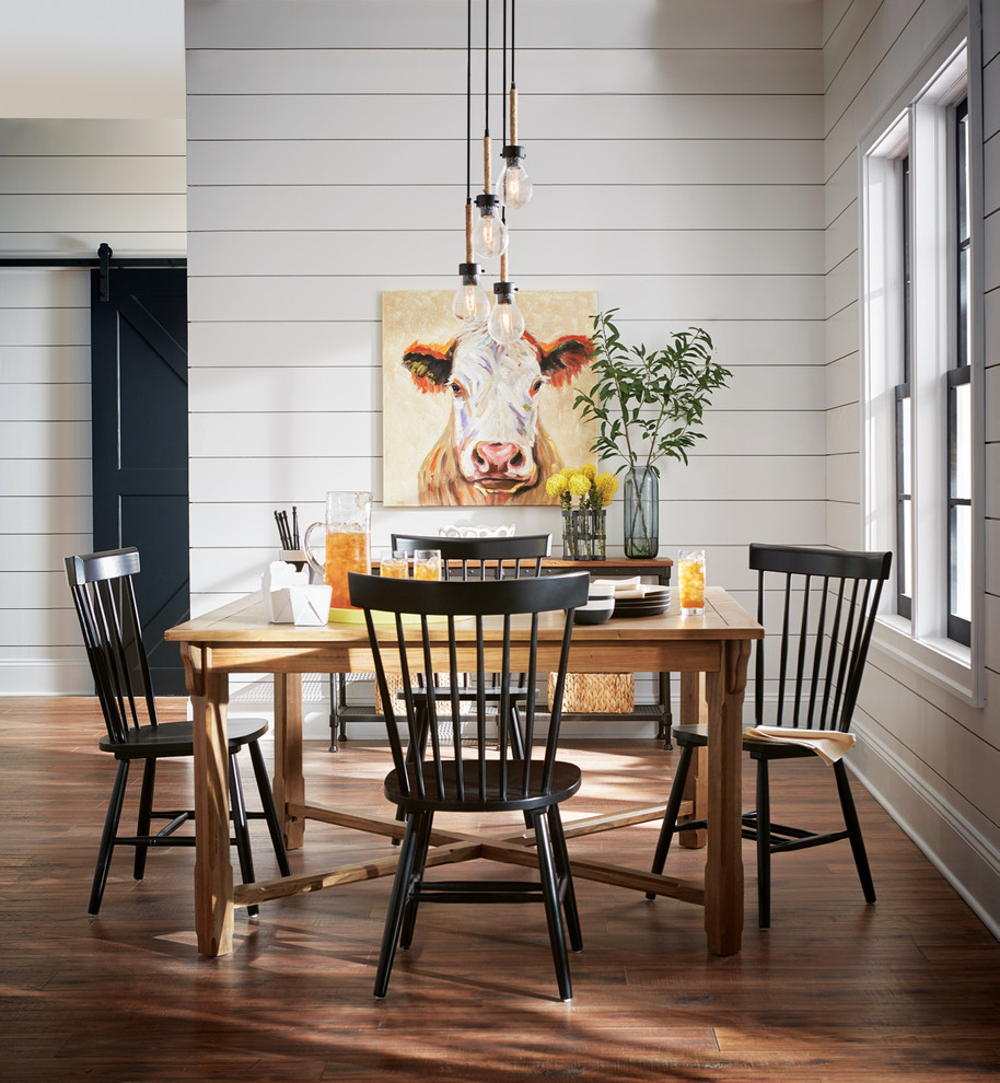 Dining room - farmhouse dark wood floor and brown floor dining room idea in Other with white walls