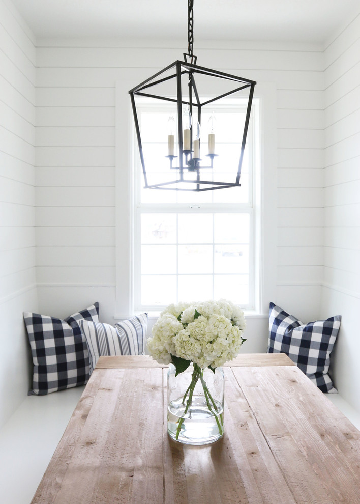 Example of a classic dark wood floor kitchen/dining room combo design in Salt Lake City with white walls