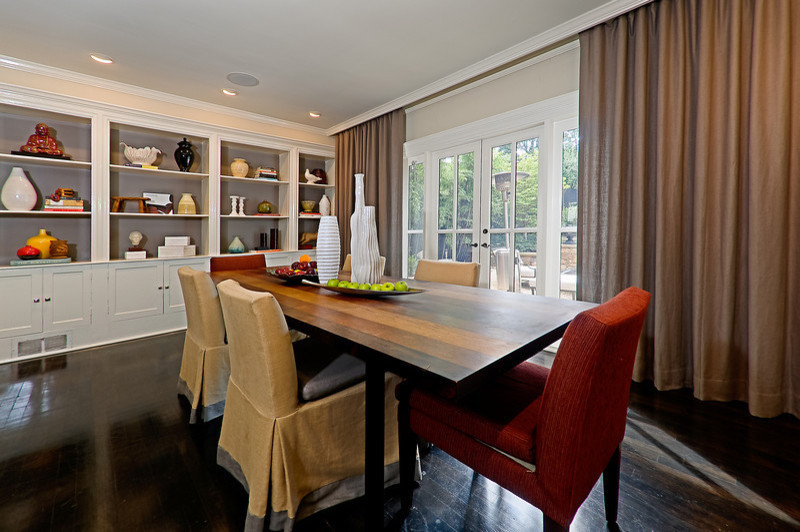 Medium sized contemporary open plan dining room in Boston with beige walls, dark hardwood flooring, no fireplace and brown floors.