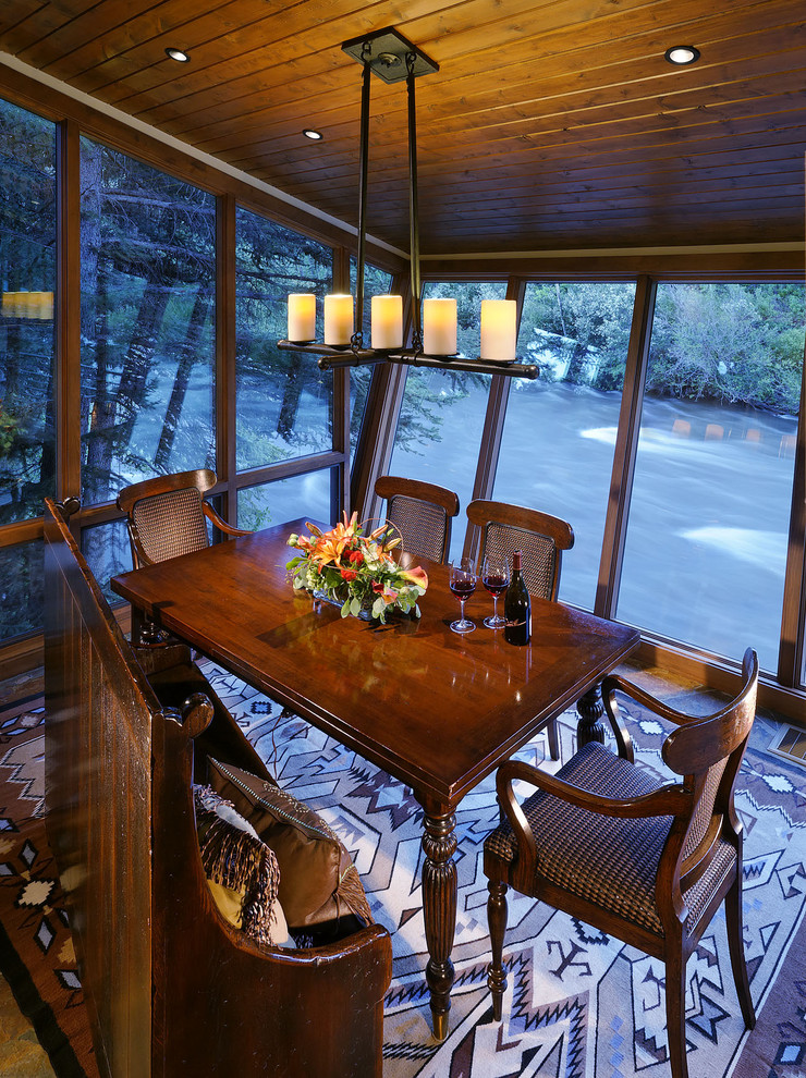 This is an example of a medium sized rustic dining room in Denver.