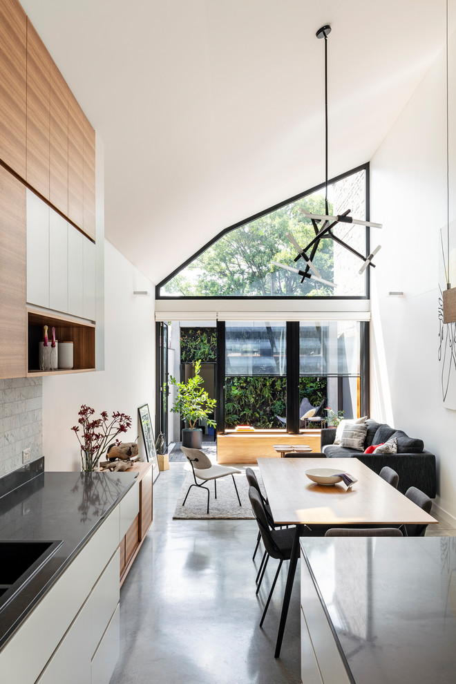 Medium sized contemporary dining room in Sydney.