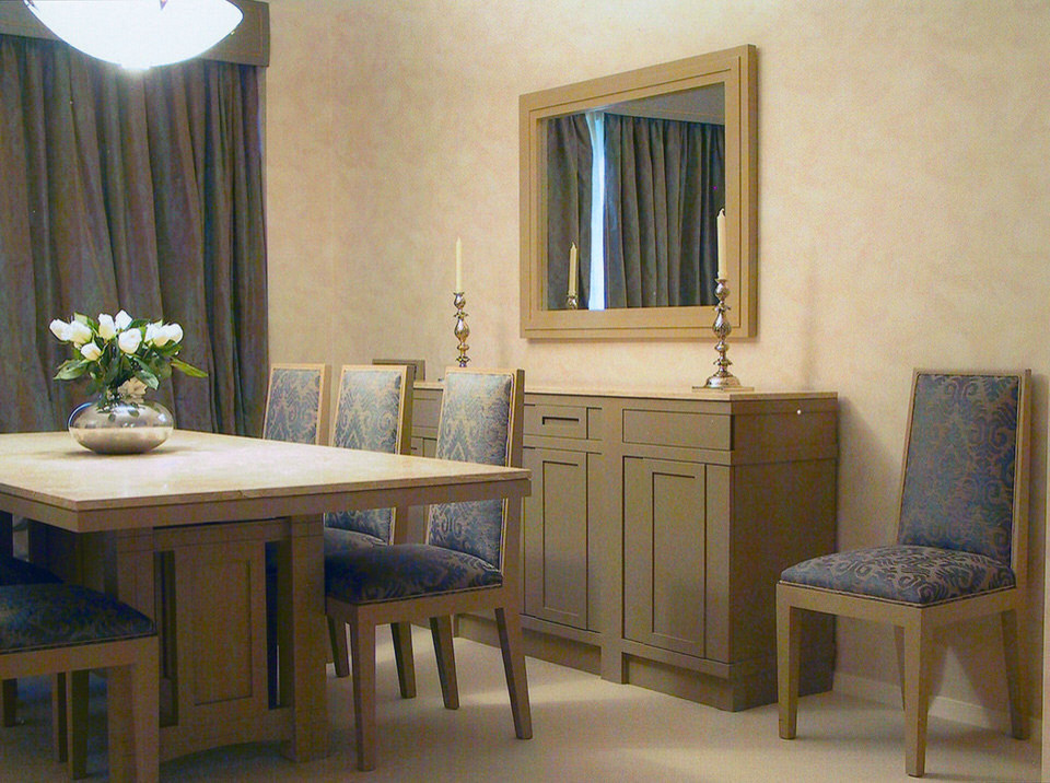 Example of a large transitional carpeted dining room design in New York with beige walls