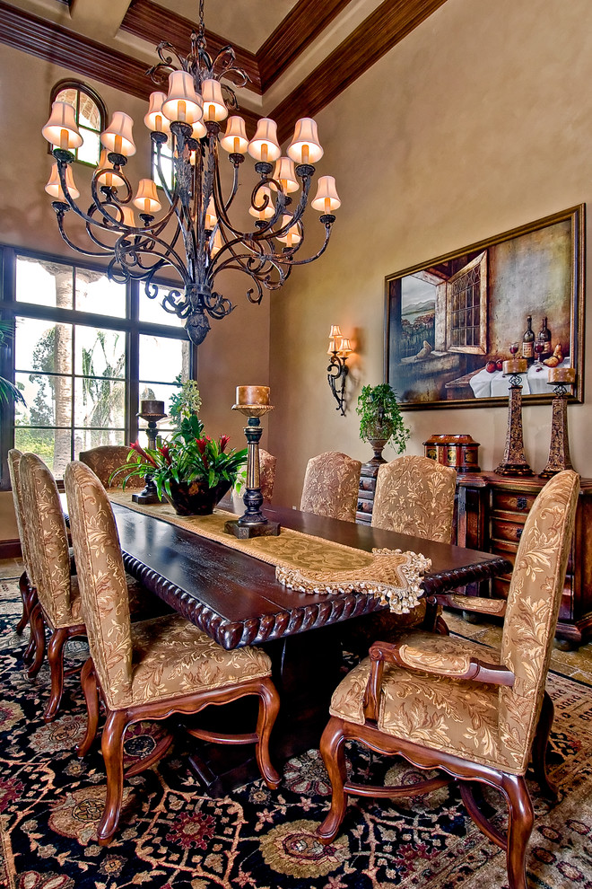 Example of a large classic enclosed dining room design in San Diego with brown walls