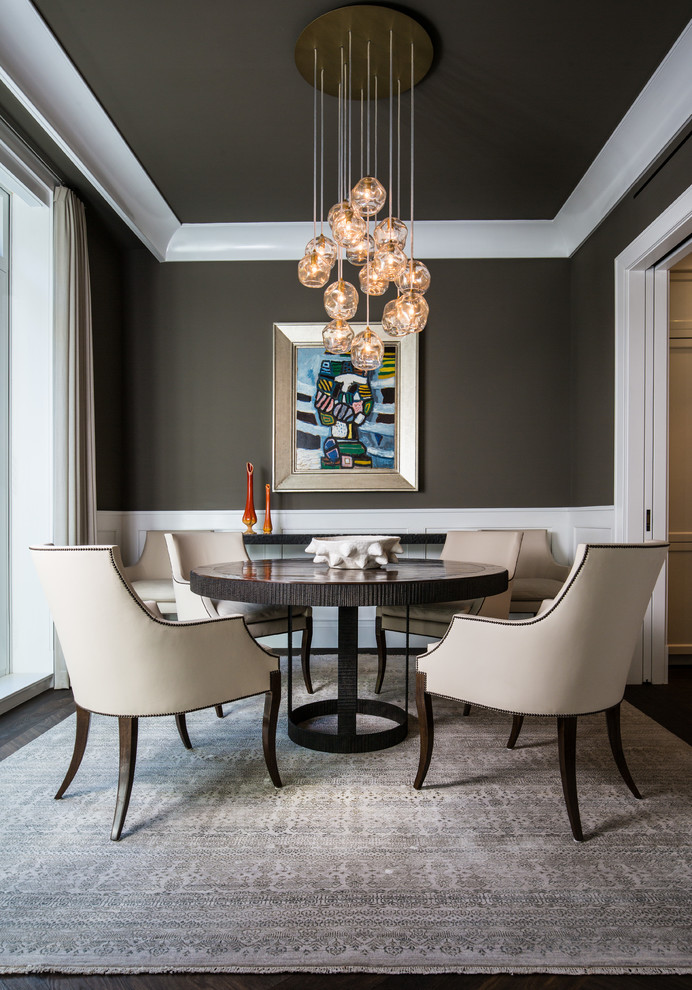 Inspiration for a traditional dining room in New York with grey walls.