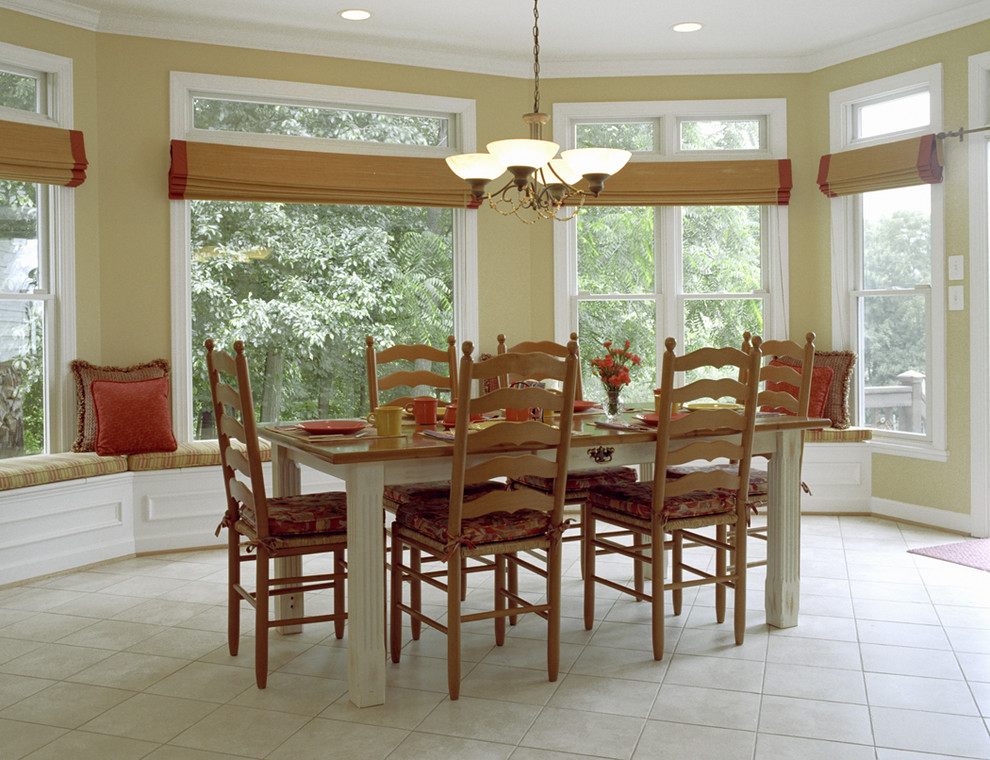 This is an example of a traditional dining room in DC Metro with yellow walls.