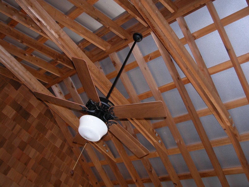 Example of a country dining room design in Austin