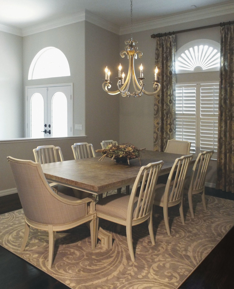 Design ideas for a small traditional open plan dining room in Tampa with grey walls, dark hardwood flooring, no fireplace and brown floors.