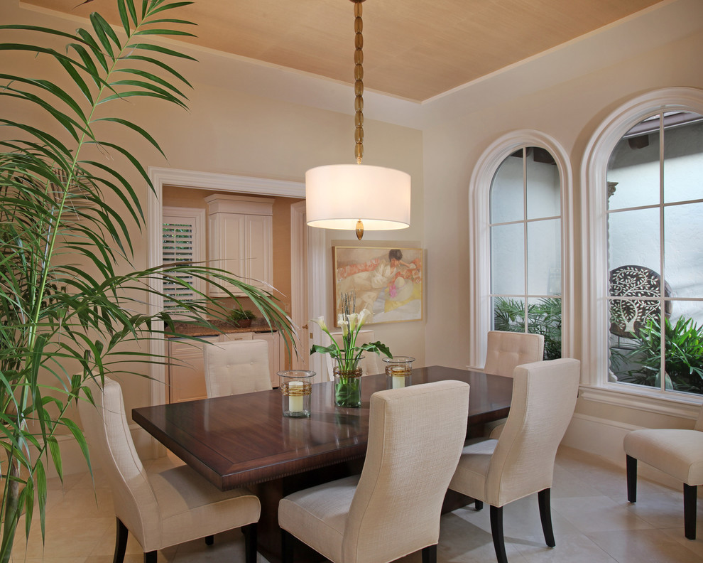 Photo of a contemporary dining room in Miami with beige walls.
