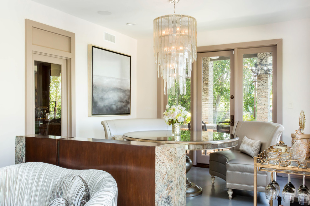 Inspiration for a large contemporary concrete floor kitchen/dining room combo remodel in Los Angeles with beige walls