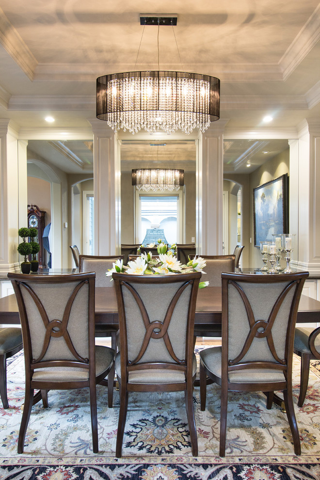 This is an example of a medium sized classic dining room in Portland with grey walls and medium hardwood flooring.