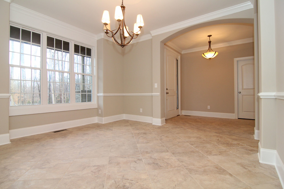 Large modern enclosed dining room in Raleigh with grey walls and ceramic flooring.