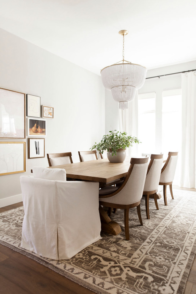 Dining room - transitional dark wood floor and brown floor dining room idea in Sacramento with gray walls