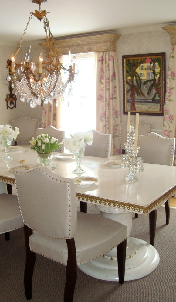 This is an example of a medium sized traditional dining room in New York with beige walls.