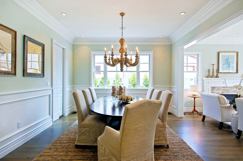 Dining room - traditional dark wood floor dining room idea in Los Angeles with green walls