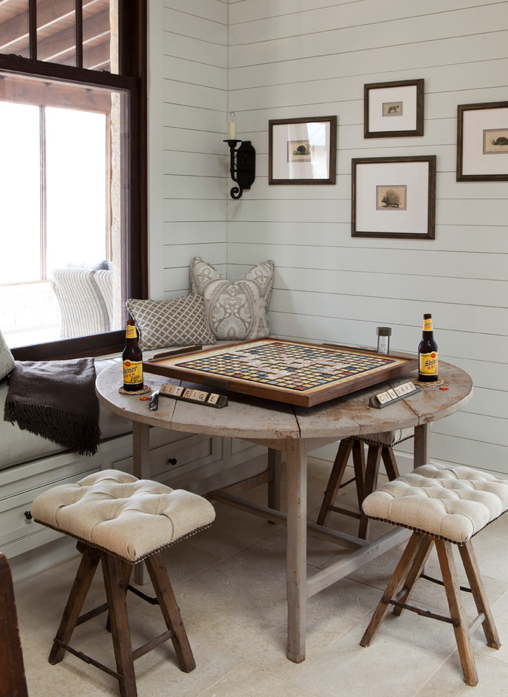 Inspiration for a cottage dining room remodel in Austin with white walls
