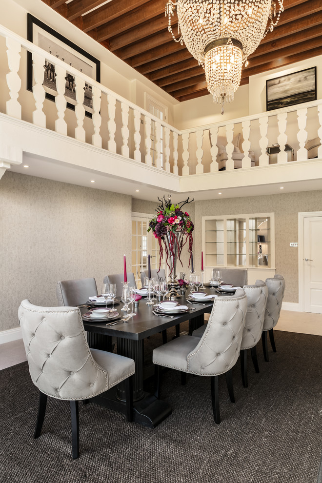 Inspiration for a mid-sized transitional gray floor dining room remodel in Berkshire with gray walls