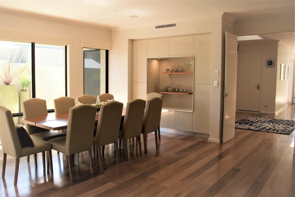 Great room - large modern light wood floor and yellow floor great room idea in Perth with white walls