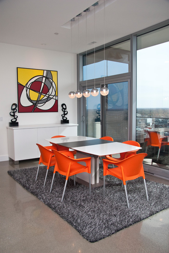 Trendy dining room photo in Grand Rapids with white walls