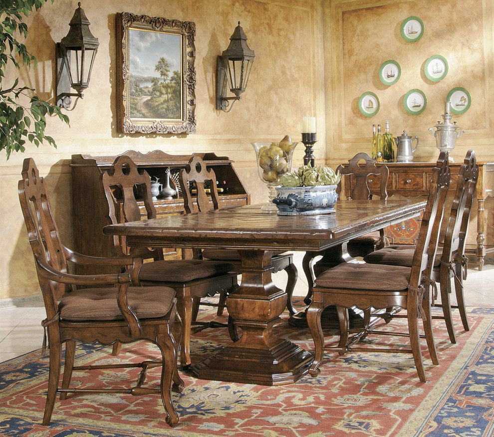 Mid-sized tuscan carpeted enclosed dining room photo in Phoenix with beige walls