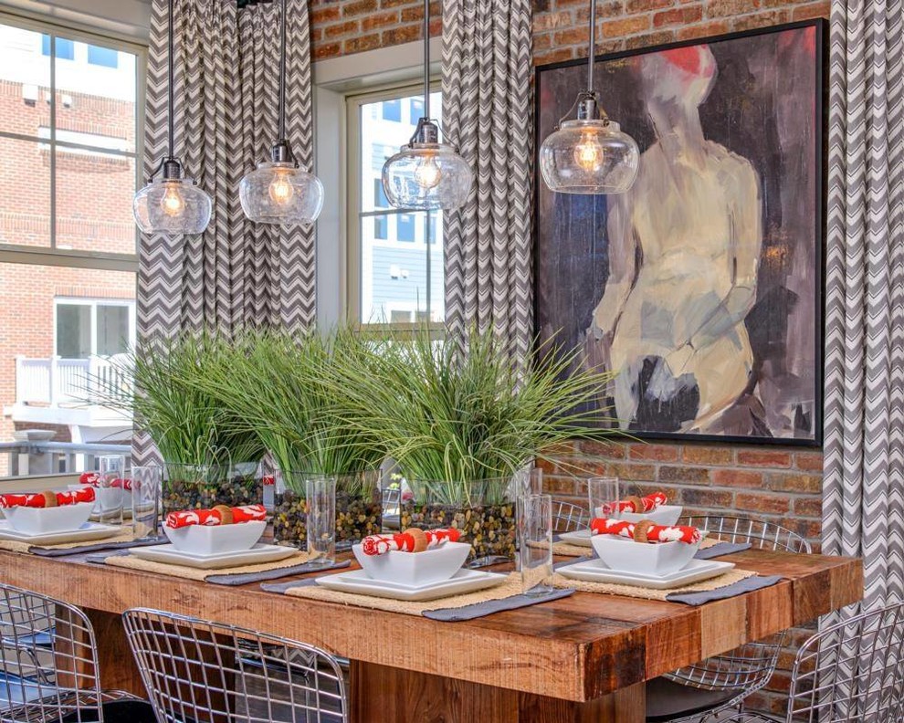 Urban dining room in Portland Maine with red walls.