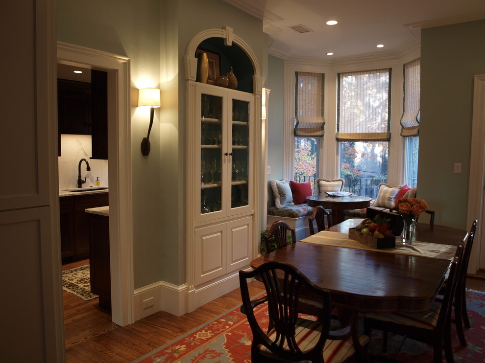 Large elegant dark wood floor enclosed dining room photo in Boston with green walls and no fireplace