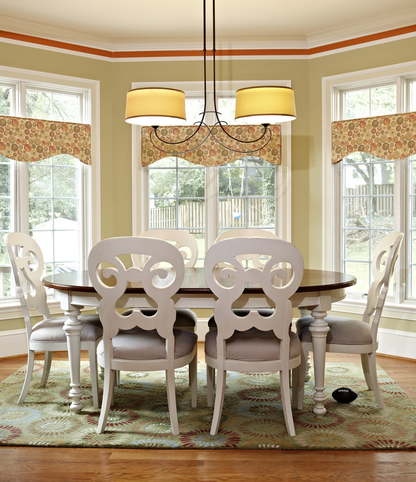 Inspiration for a medium sized traditional enclosed dining room in DC Metro with beige walls, dark hardwood flooring, no fireplace and brown floors.