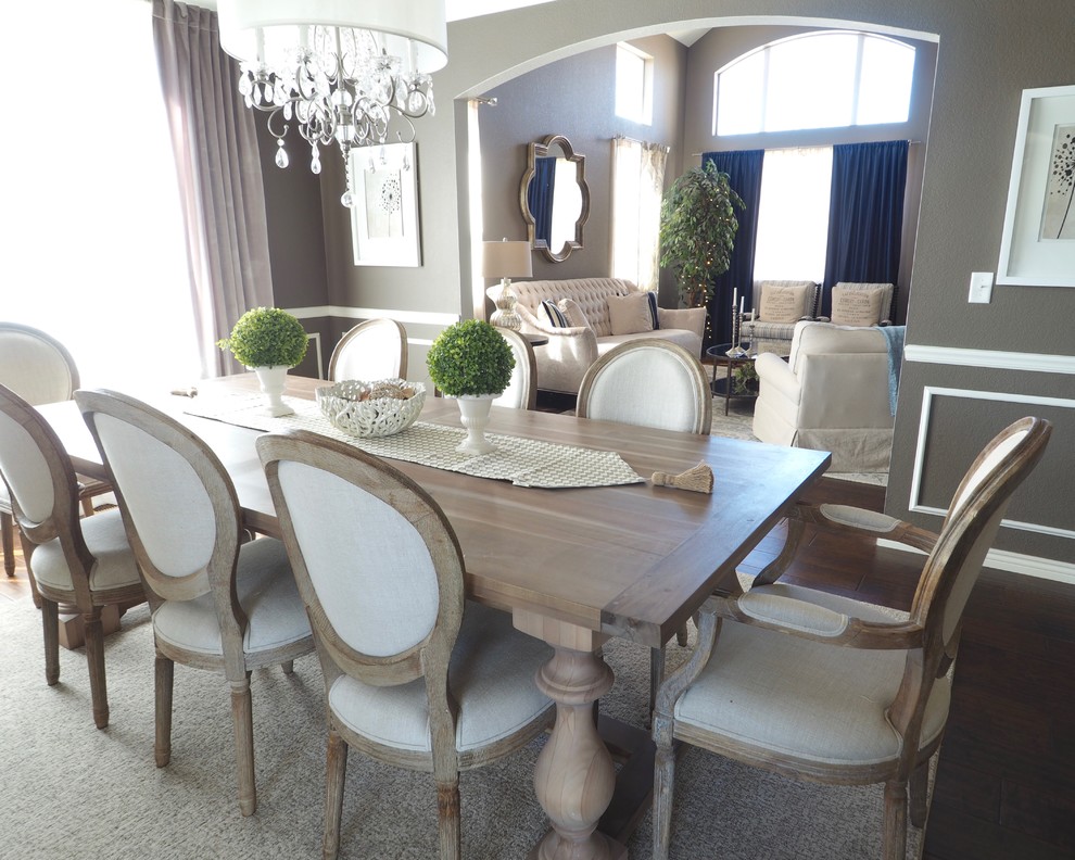 Medium sized traditional enclosed dining room in Denver with grey walls, dark hardwood flooring and feature lighting.