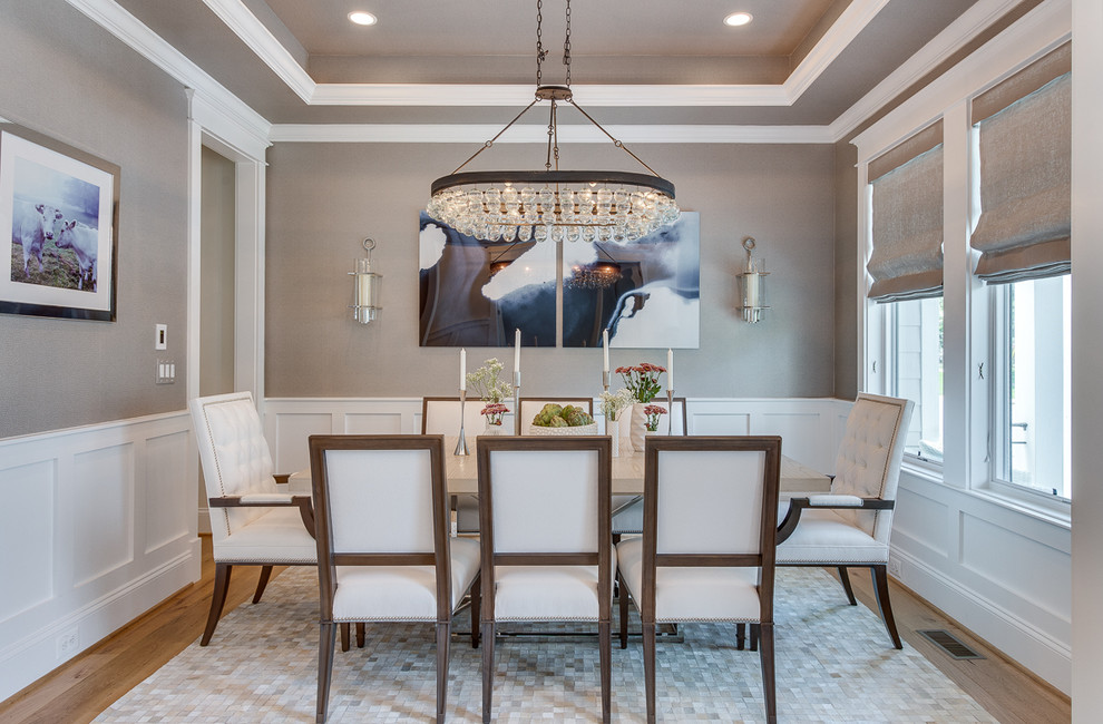Design ideas for a large classic enclosed dining room in DC Metro with grey walls, light hardwood flooring and no fireplace.