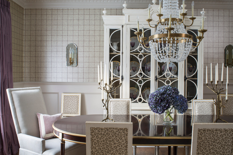 This is an example of a traditional dining room in Chicago with beige walls.