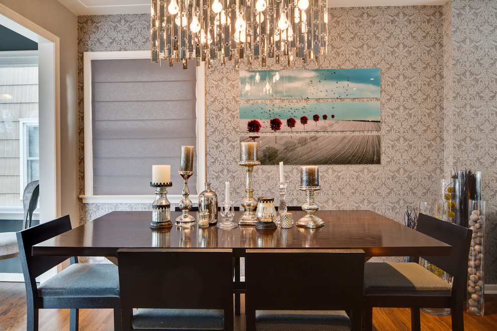 Example of an eclectic dark wood floor enclosed dining room design in Minneapolis