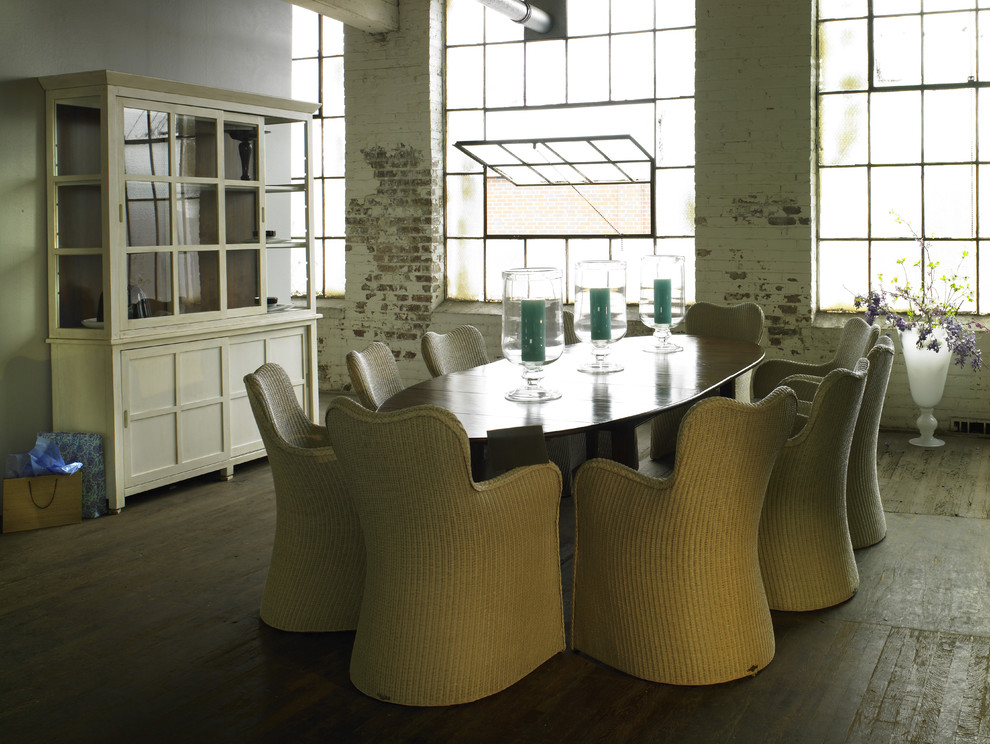 Inspiration for an urban dining room in Atlanta with white walls and dark hardwood flooring.