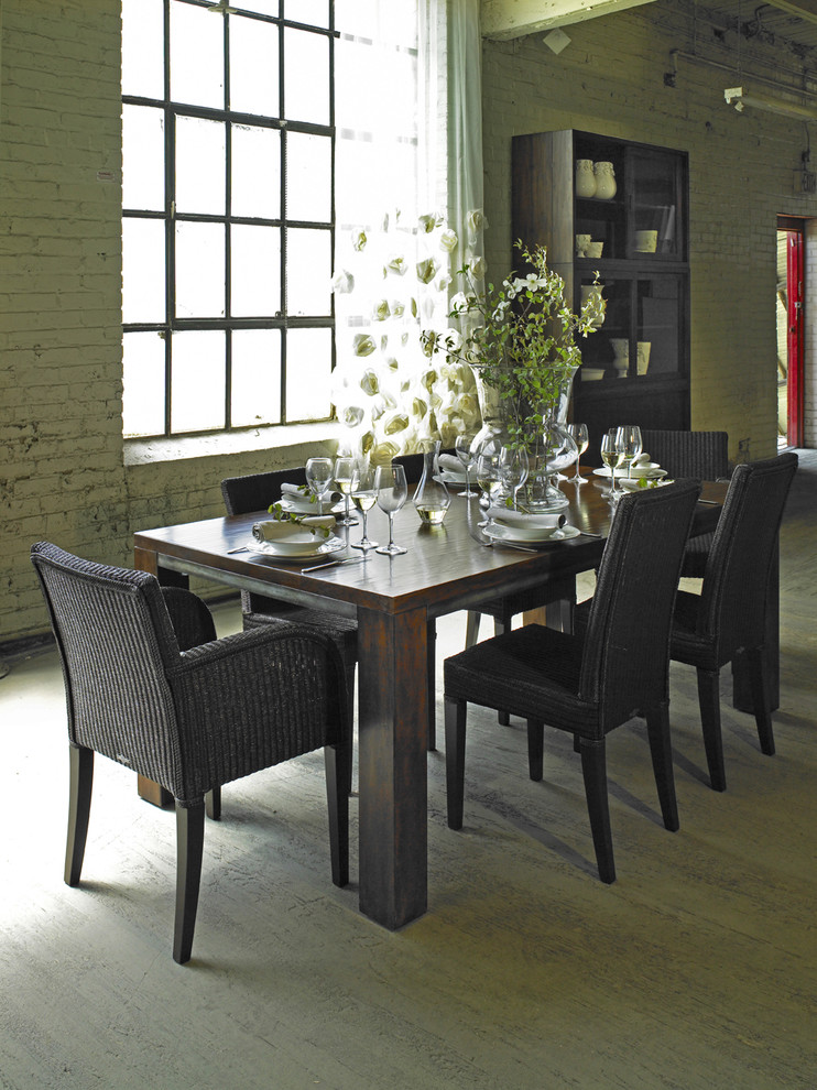 Example of a transitional dining room design in Atlanta with white walls