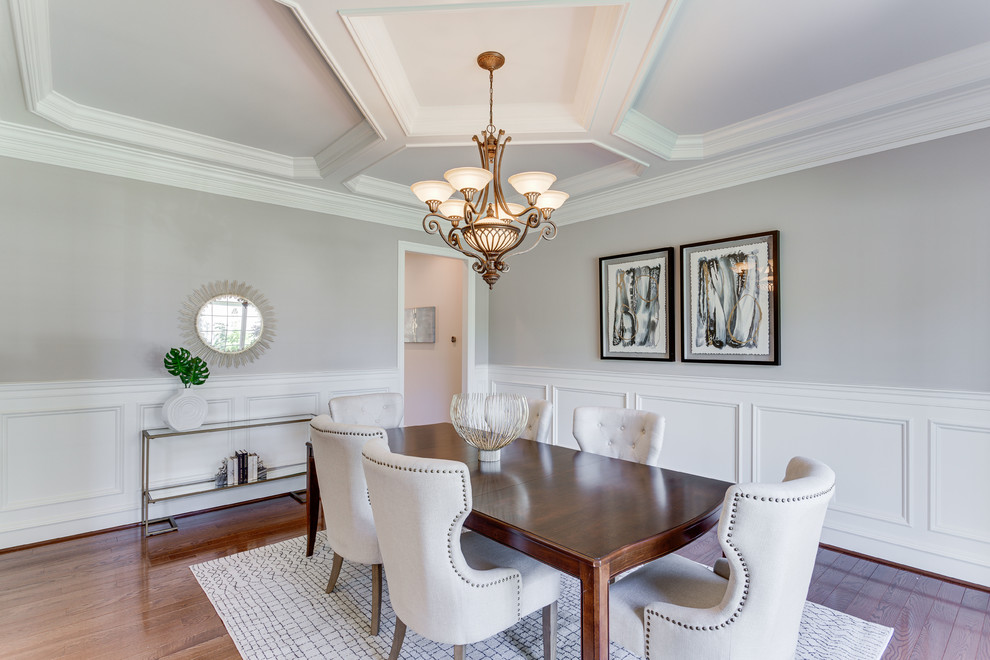 Design ideas for a large traditional enclosed dining room in DC Metro with grey walls and medium hardwood flooring.