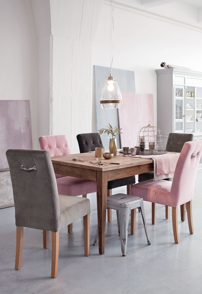 Inspiration for a rural dining room in Hamburg with white walls.