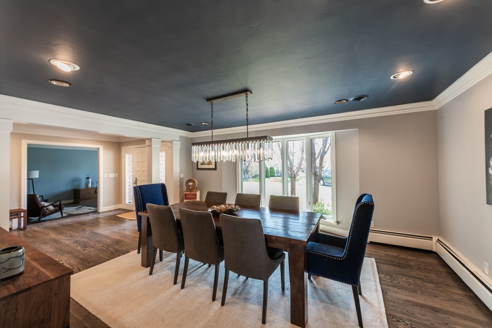 Photo of a large contemporary enclosed dining room in Denver with grey walls, dark hardwood flooring and brown floors.