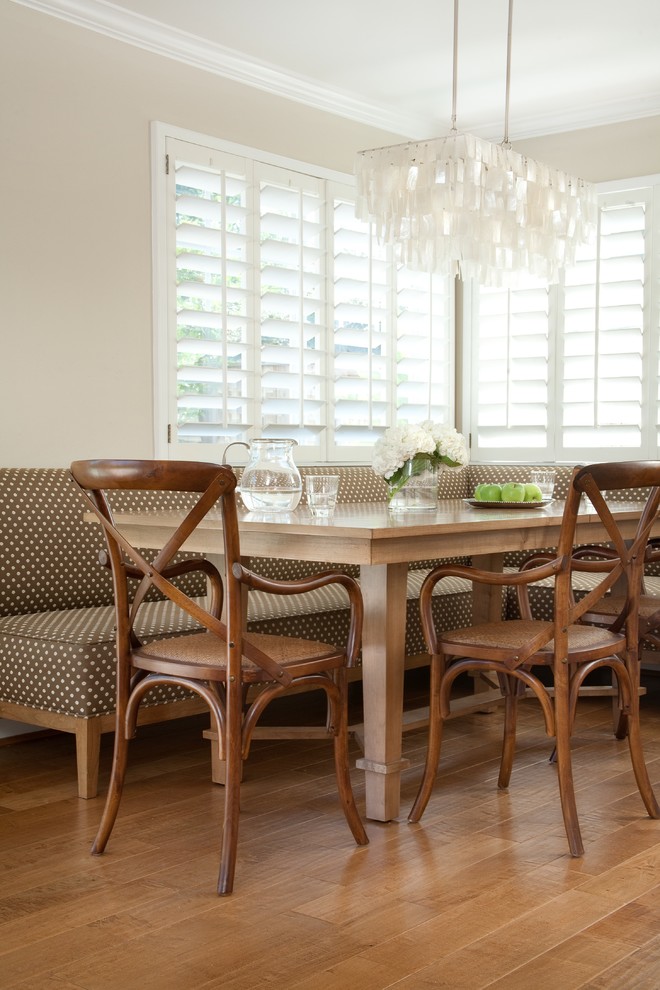 Kitchen/dining room combo - large traditional medium tone wood floor kitchen/dining room combo idea in Santa Barbara with beige walls